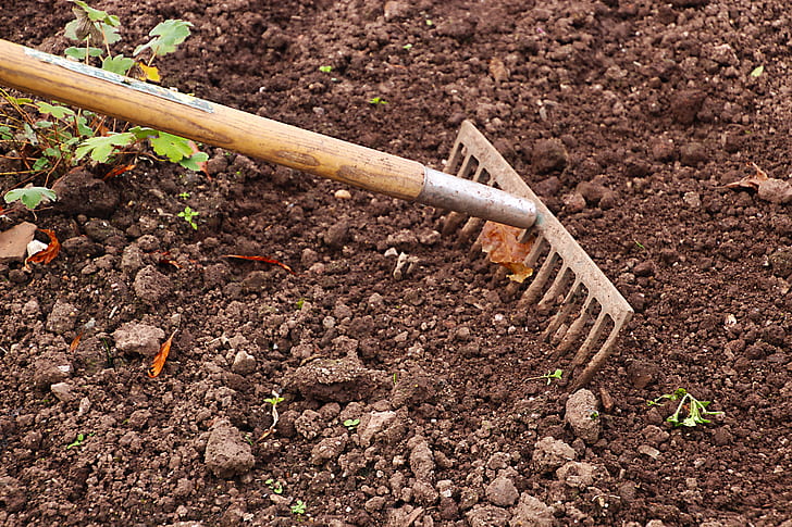 garden soil with rake on top