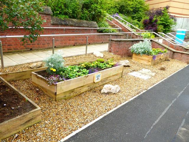 square foot gardening along sidewalk