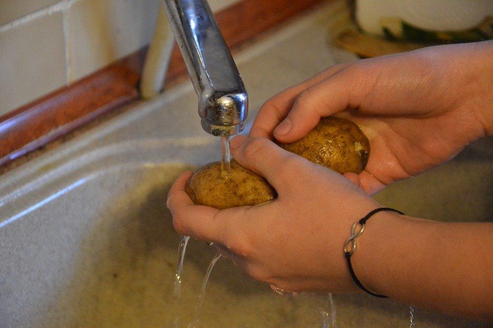 washing a potato